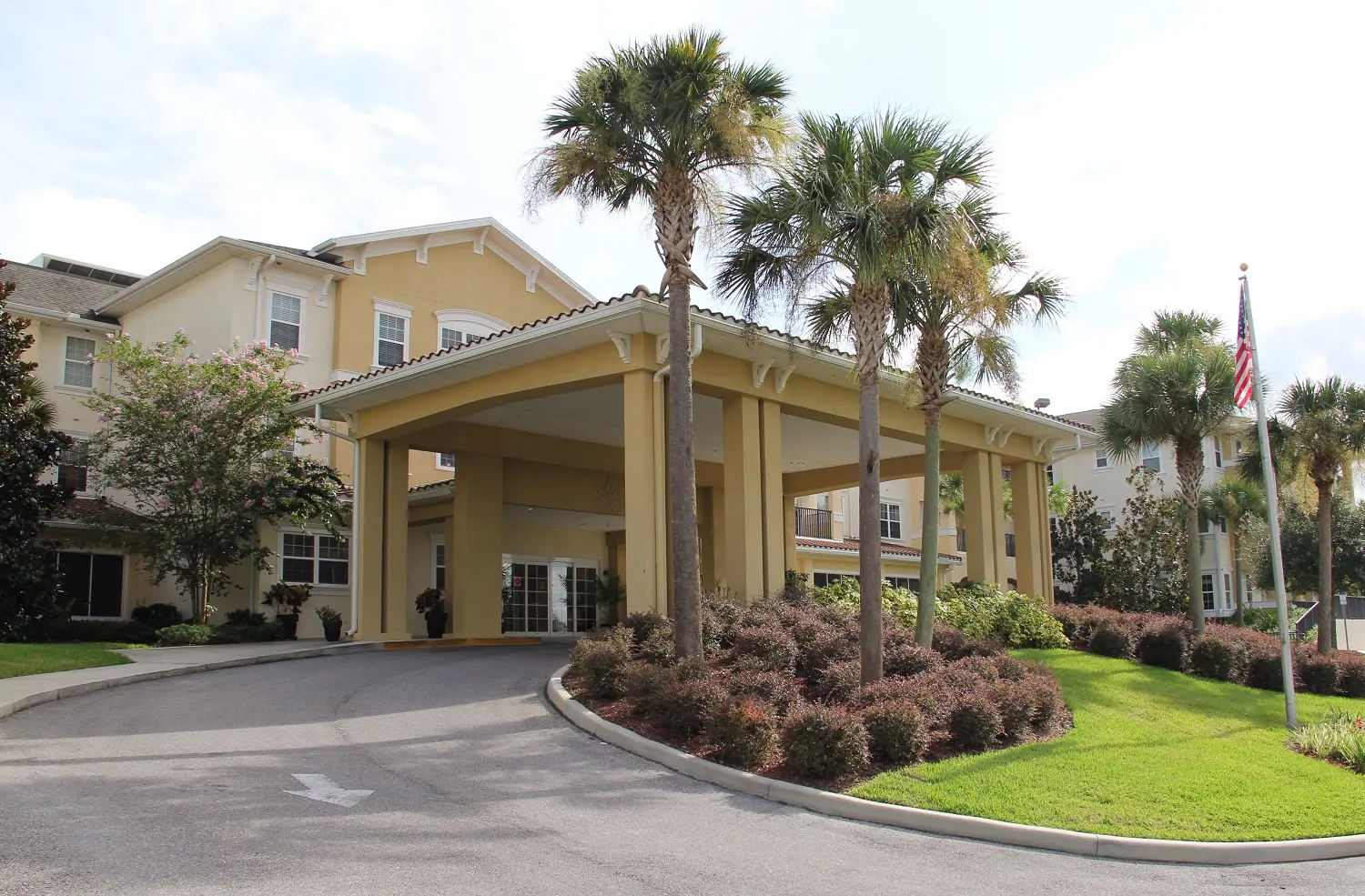 Front entrance at American House Zephyrhills Senior Living Community